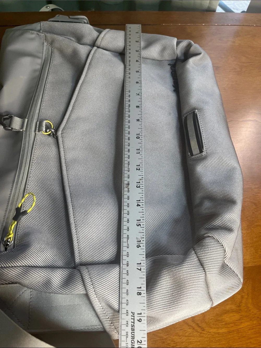 Marmot Light Gray Roll-Top Laptop Messenger Bag with Yellow Accents
